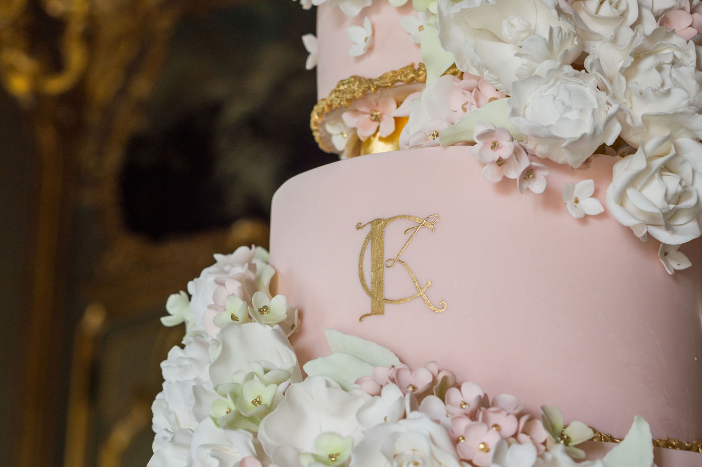 A Closeup Of The Gold Hand Painted Initials On The Cliveden House Luxury Wedding Cake by GC Couture