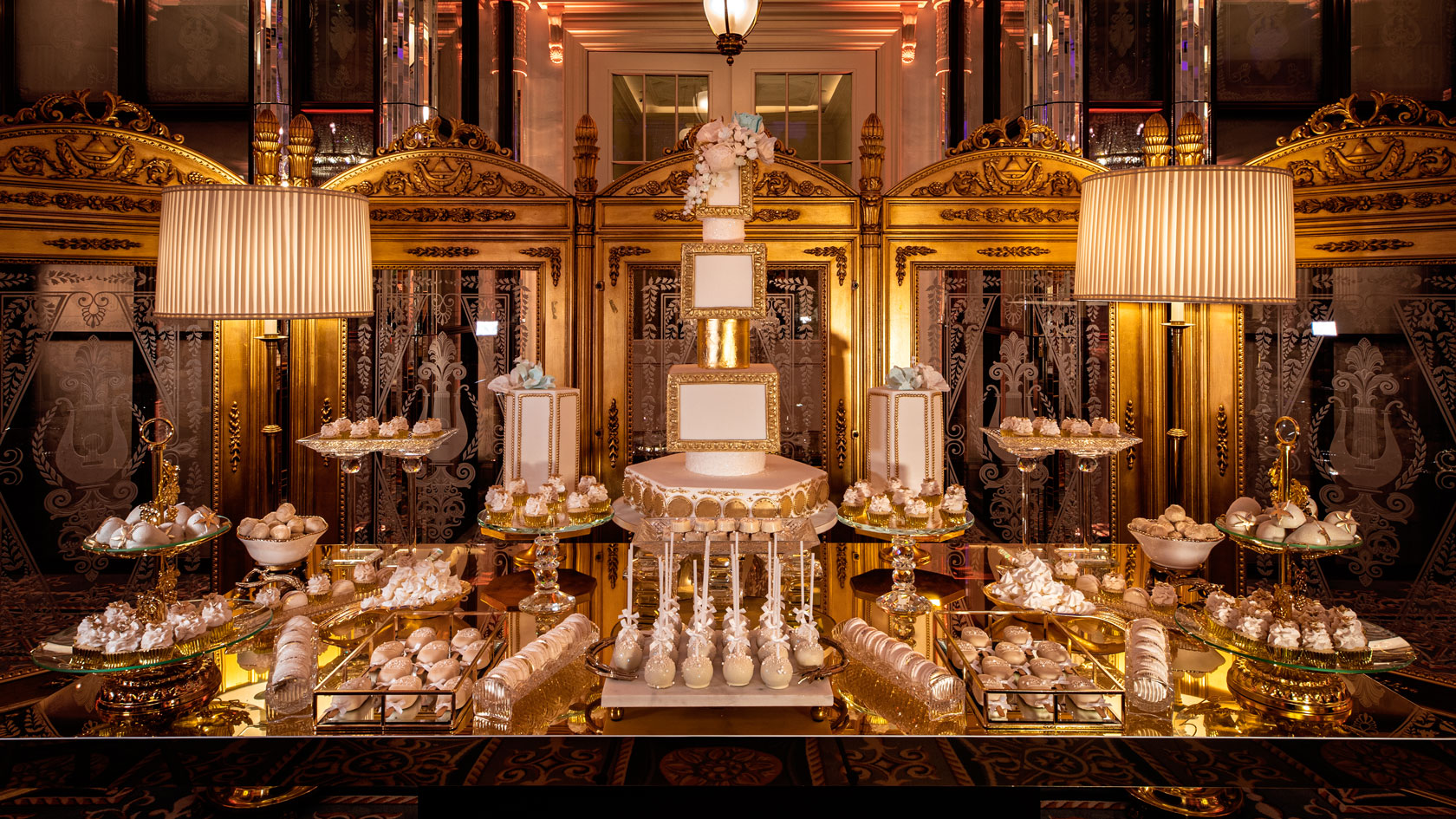 Ornate gold dessert table cake display at The Lanesborough, London